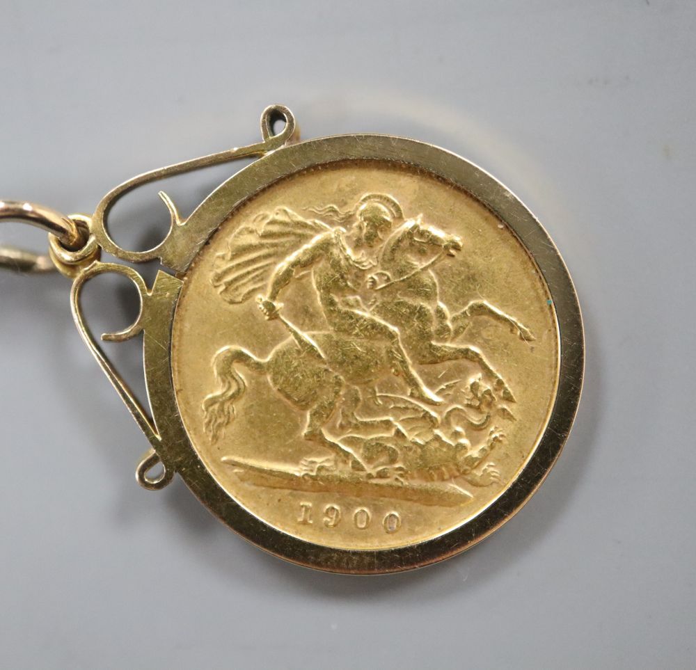 A gold half sovereign pendant